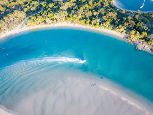 Drone Aerial Views Collection: Aerial View of Noosa River with boat passing through