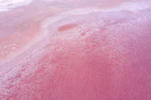 Aerial view of patterns, textures and amazing colors, pink, purple and orange over a Pink Lake Aerial view of patterns, textures and amazing colors, pink, purple and orange over a Pink Lake