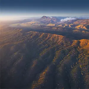 An aerial view of the rugged and scenically beautiful mountain ranges of Wilpena Pound in the southern region of the Flinders Ranges National Park in South Australia