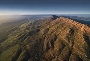 An aerial view of the rugged and scenically beautiful mountain ranges of Wilpena Pound in the southern region of the Flinders Ranges National Park in South Australia