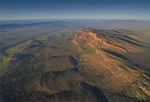 An aerial view of the rugged and scenically beautiful mountain ranges of Wilpena Pound in the southern region of the Flinders Ranges National Park in South Australia