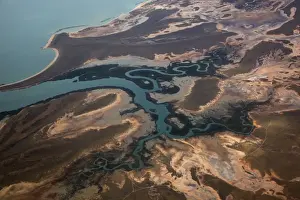 Port Hedland Prints: Aerial view of uncultivated landscape at the coast