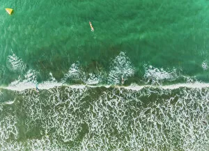 Aerial Beach Photography Collection: Aerial View Of Waves Splashing On Beach and People Surfing, Auckland, New Zealand
