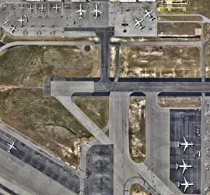 <b class=qtipBold><figcaption>Airplanes Parked</figcaption></b><br>Airport and airplanes from above<br><em>© This content is subject to copyright.</em> Airplanes Parked