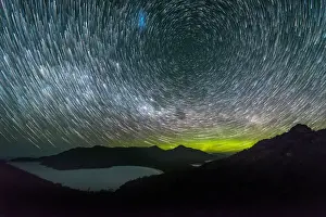 Aurora Australis or Southern Lights and Star Trails over Wineglass Bay, Freycinet Peninsula, Tasmania
