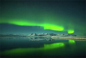 Aurora Borealis Collection: Aurora Borealis at Jokulsarlon lagoon in winter, southern Iceland