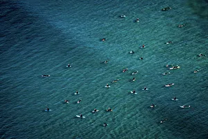 <b class=qtipBold><figcaption>Aussie Surfers</figcaption></b><br>Surfing is both a culture lifestyle across all ages and gender in Australia. This photo was taken onboard a helicopter hovering above Sydneyas eastern beaches.<br><em>© This content is subject to copyright.</em> Aussie Surfers