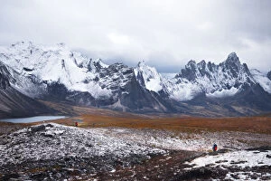 Images Dated 4th September 2014: Backpacker with tombstone mountain
