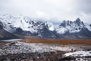 Naphak Modhiran Prints: Backpacker with tombstone mountain