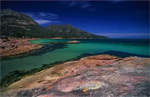 The beautiful aqua waters of honeymoon Bay on the Freycinet Peninsular, East coast of Tasmania