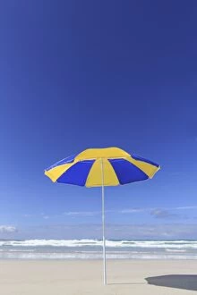 Images Dated 16th October 2014: Blue and yellow beach umbrella