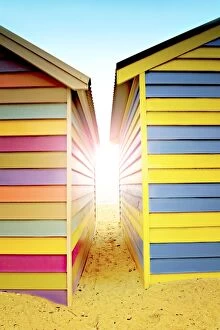 Images Dated 12th October 2015: Bright sunlight between beach huts