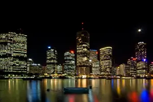 Craig Jewell Photography Prints: Brisbane by night city moon and dinghy