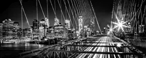 Az Jackson Prints: Brooklyn Bridge and Mahanttan skyline at night in black and white