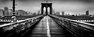 Az Jackson Prints: Brooklyn Bridge and Manhattan skyline under heavy fog in black and white