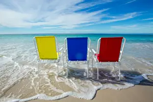 Three chairs at the beach. Australia