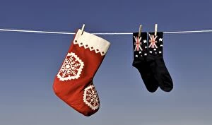Images Dated 13th November 2014: Christmas stockings hanging on washing line
