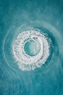 Images Dated 24th August 2019: Circle patterns created by jet ski at sea as seen from directly above, Barbados