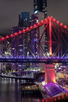 Business Prints: Cityscape of Brisbane City and the Story Bridge taken at night from across the Brisbane