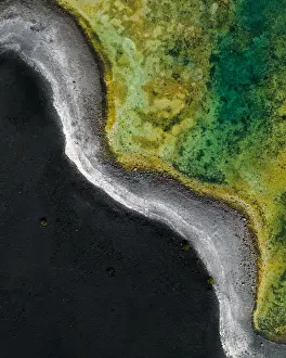Images Dated 2nd August 2019: Contrast between volcanic sand and vibrant salt lake as seen from above, Lanzarote