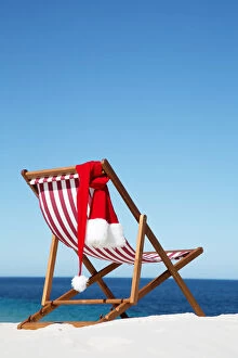Images Dated 13th November 2014: Deck Chair with Santa hat. Christmas. Australia