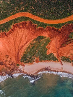 Abstract Aerial Art Collection: Dirt road and rock formations photographed from above, James Price Point, Australia