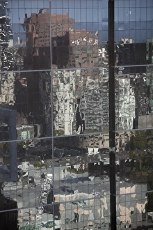 Distorted reflections of city skyscraper in Melbourne, Victoria, Australia Distorted reflections of city skyscraper in Melbourne, Victoria, Australia