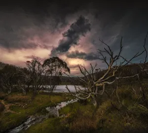 Dramatic storm clouds pass over the landscape in the Kosciuszko National Park Dramatic storm clouds pass over the landscape in the Kosciuszko National Park