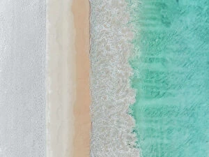 Images Dated 10th August 2023: Drone image looking down on Ocean waves rolling onto Cottesloe Beach, Perth, Western Australia