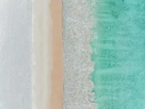Images Dated 10th August 2023: Drone image looking down on Ocean waves rolling onto Cottesloe Beach