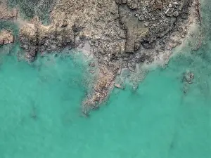 Abstract Aerial Art Prints: Drone image showing sedimentary rock at the edge of the Indian Ocean