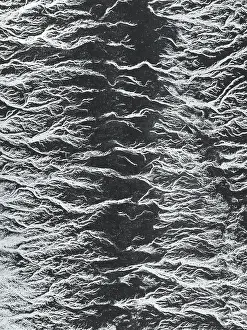 Abstract Aerial Art Prints: Drone photo looking down on abstract patterns of Ocean water created by a spring tide
