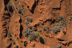 Drone point of view over the red earth of the Australian Outback Drone point of view over the red earth of the Australian Outback