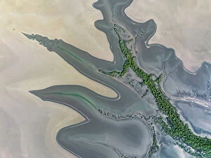 Images Dated 10th August 2023: Drone shot looking down on the edge of a flood plain, Wyndham, Western Australia, Australia