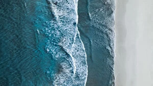 Drone Aerial Views Collection: Drone shot showing waves rolling onto a beach, Esperance, Australia