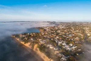 Prints of Early morning covering partial area of houses along the sea in Auckland, New Zealand New Zealand Prints: Early morning in Auckland