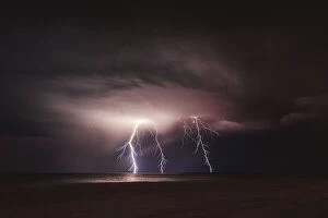Lightning Strikes Collection: Electrical storm on a beach in Shark Bay