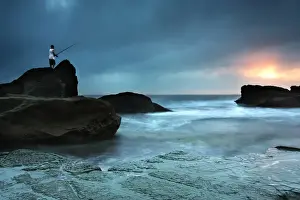 Fisherman at Forresters beach