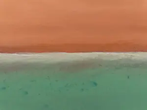 Images Dated 12th July 2023: Gentle waves rolling onto Simpson Beach from the Indian Ocean photographed from a drone point of view