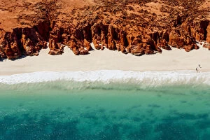 Images Dated 11th August 2017: A helicopter view of the white sands, turquoise ocean and striking red Kooljaman Cliffs at Cape