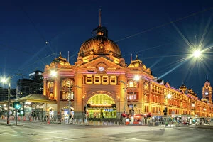 Buildings and Architecture Puzzles Collection: Historic building Flinders railway station is the biggest station at twilight in