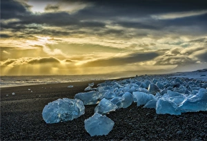 Icebergs on the black volcanic beach at Jokulsarlon, southern Iceland Icebergs on the black volcanic beach at Jokulsarlon, southern Iceland
