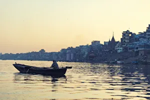 indian people rowing boat in Ganga river varanasi india indian people rowing boat in Ganga river varanasi india