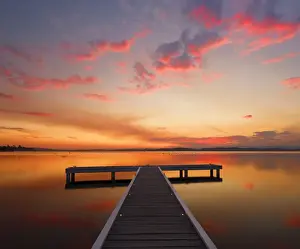 jetty with sunset at lake