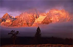 The kiss of dawn sunlight over the mountains in the Grand Teton National Park, Wyoming