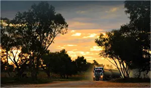 Large rig rumbling down an outback dusty road near Innamincka, remote outback, South Australia