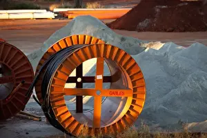 Mine Prints: Large spools of cable at a mine