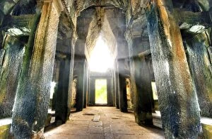 Images Dated 17th April 2009: Light Shining Through the Openings Into the Interior of Angkor Wat, Siem Reap, Cambodia