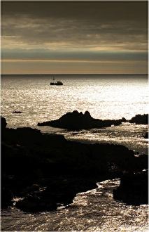 A lobster trawler near dusk on the Tarkine coastline of Tasmania A lobster trawler near dusk on the Tarkine coastline of Tasmania