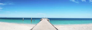 Awe Inspiring Australian Panoramas Collection: Long concrete pier leading out into blue ocean